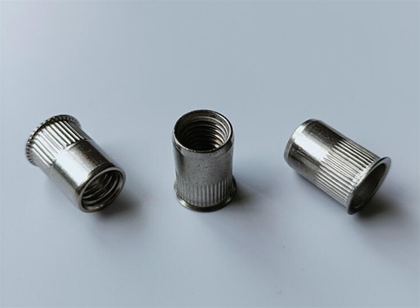 Reduced head rivet nut  